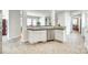 Well-lit kitchen featuring stainless steel appliances and stone countertops at 122 Blandina Ct, Fort Mill, SC 29708