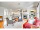 Inviting living room with a fireplace and open view to the modern white kitchen at 122 Blandina Ct, Fort Mill, SC 29708