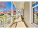 Wide, covered front porch featuring classic white columns and plenty of space for outdoor enjoyment at 122 Blandina Ct, Fort Mill, SC 29708