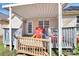Cozy covered deck featuring a play area, perfect for outdoor relaxation and Gathering fun at 1229 Kent Dr, Lancaster, SC 29720