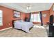 Large main bedroom with tray ceiling, carpet floors and ample natural light at 1229 Kent Dr, Lancaster, SC 29720
