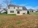 Spacious backyard featuring a patio and mature lawn; ideal for outdoor living and entertaining at 1400 Wessex Ct, Monroe, NC 28110