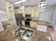 Well-equipped kitchen features granite countertops, stainless steel appliances, and ample cabinet space at 1400 Wessex Ct, Monroe, NC 28110