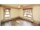 Bedroom with wood-look floors, natural light, and decorative accents at 142 Wilson Ne St, Concord, NC 28025