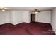 Large living room with neutral paint and a ceiling fan, perfect for entertaining at 142 Wilson Ne St, Concord, NC 28025
