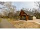 Charming picnic shelter with stone accents in a serene park-like setting, perfect for outdoor gatherings at 142 Wilson Ne St, Concord, NC 28025