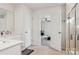 Bathroom with double vanity, shower, and tile floor at 146 Dogwood Grove Pl, Troutman, NC 28166