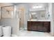Bathroom with a glass shower, dark wood vanity, and tile flooring at 147 Belfry Loop, Mooresville, NC 28117