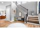 Elegant entryway with a staircase and stylish decor at 147 Belfry Loop, Mooresville, NC 28117