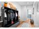 Functional mudroom with storage and a view into the home at 147 Belfry Loop, Mooresville, NC 28117