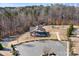 Aerial shot of an expansive picnic pavilion surrounded by parking and a nearby playground at 147 Belfry Loop, Mooresville, NC 28117