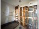 Bathroom under construction showcasing modern tile work, plumbing, and natural light at 1600 Julia Maulden Pl, Charlotte, NC 28206