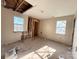 Bedroom under renovation featuring two windows allowing plenty of natural light at 1600 Julia Maulden Pl, Charlotte, NC 28206