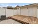 A private fenced backyard features a wooden deck, patio, and convenient outdoor access at 163 Singleton Rd, Mooresville, NC 28117