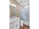 This bathroom features a glass-enclosed shower and vanity with marble countertop at 163 Singleton Rd, Mooresville, NC 28117
