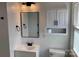 Bathroom featuring modern vanity, stylish mirror, and updated fixtures for a fresh look at 177 Valleydale Dr, Gastonia, NC 28056