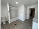 Bathroom featuring a tub-shower combo, toilet, and granite-style vanity at 188 13Th Se St, Hickory, NC 28602