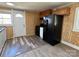 The kitchen features updated appliances, wood cabinets, and durable laminate floors at 188 13Th Se St, Hickory, NC 28602