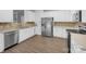 Well-equipped kitchen featuring stainless steel appliances, sleek countertops, and ample cabinet space at 1913 Leesburg Dr, Clover, SC 29710