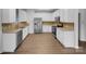 Bright kitchen features stainless steel appliances, ample counter space, and tile backsplash at 1913 Leesburg Dr, Clover, SC 29710