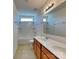 Bathroom featuring a double sink vanity, and a shower/tub combo at 242 Elrosa Rd, Mooresville, NC 28115