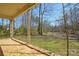 Tranquil backyard view from the porch, highlighting the serene setting and natural landscape at 2519 Arnold Dr, Monroe, NC 28110