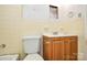 Bathroom showcasing vanity, toilet, and tile work; renovation will highlight its potential at 2519 Arnold Dr, Monroe, NC 28110