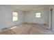 Open bedroom layout with natural light through windows, ready for transformation into your dream space at 2519 Arnold Dr, Monroe, NC 28110