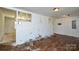 Blank bonus room featuring wood floors, white walls, and an open design at 2519 Arnold Dr, Monroe, NC 28110