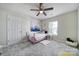bedroom with a ceiling fan, carpeted floor, and a single bed with colorful decorations at 257 Notable Ln, Rock Hill, SC 29732