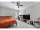 This bedroom features an office space, ceiling fan, and a large screen TV at 257 Notable Ln, Rock Hill, SC 29732