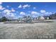 Wide view of the community playground area equipped with slides, climbing structures, and seating for residents at 257 Notable Ln, Rock Hill, SC 29732