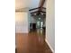 Open living room boasting vaulted ceilings, wooden beams, and a cozy fireplace feature at 2608 Glyncastle Way, Gastonia, NC 28056