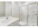 Clean bathroom featuring a vanity, toilet, and glass-enclosed shower with built-in shelves at 2783 Ashton Park Ln # 67, Monroe, NC 28110