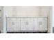Elegant buffet area showcases white cabinets with bar pull hardware and a stone countertop, perfect for entertaining guests at 2783 Ashton Park Ln # 67, Monroe, NC 28110