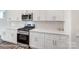 Kitchen with stainless steel appliances and white cabinets at 2783 Ashton Park Ln # 67, Monroe, NC 28110