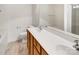 Well-lit bathroom with a double sink vanity and clean, white fixtures creating a functional space at 2924 Zion Renaissance Ln, Charlotte, NC 28269