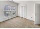 Neutral bedroom with window and spacious closet at 2924 Zion Renaissance Ln, Charlotte, NC 28269