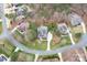 Aerial view of a luxury home nestled among trees with manicured lawns at 303 Ridge Reserve Dr # 29, Clover, SC 29710