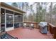 Inviting back deck with seating, grill, and peaceful wooded views, perfect for outdoor entertaining at 303 Ridge Reserve Dr # 29, Clover, SC 29710