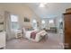 Bright, spacious bedroom with a vaulted ceiling, large windows, and natural light at 303 Ridge Reserve Dr # 29, Clover, SC 29710