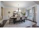 Formal dining room featuring elegant furniture, decor and natural lighting at 303 Ridge Reserve Dr # 29, Clover, SC 29710