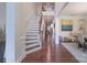 View of the foyer featuring hardwood floors, staircase, and neutral wall paint at 303 Ridge Reserve Dr # 29, Clover, SC 29710