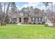 Charming two-story home with a brick facade, classic shutters, and an inviting front porch at 303 Ridge Reserve Dr # 29, Clover, SC 29710