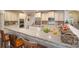 Open concept kitchen boasts granite countertops, breakfast bar, and stainless appliances at 303 Ridge Reserve Dr # 29, Clover, SC 29710