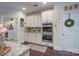Spacious kitchen with stainless double ovens, granite countertops, and eat-in area at 303 Ridge Reserve Dr # 29, Clover, SC 29710
