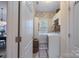 View of the laundry room with built-in cabinets and modern washer and dryer at 303 Ridge Reserve Dr # 29, Clover, SC 29710