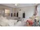 Large living room with plenty of seating, an entertainment center, plush carpet, and modern decor at 303 Ridge Reserve Dr # 29, Clover, SC 29710