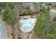 Aerial view of a community pool surrounded by trees at 303 Ridge Reserve Dr # 29, Clover, SC 29710