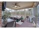Inviting screened porch with comfortable seating, dining area, and wooded views at 303 Ridge Reserve Dr # 29, Clover, SC 29710